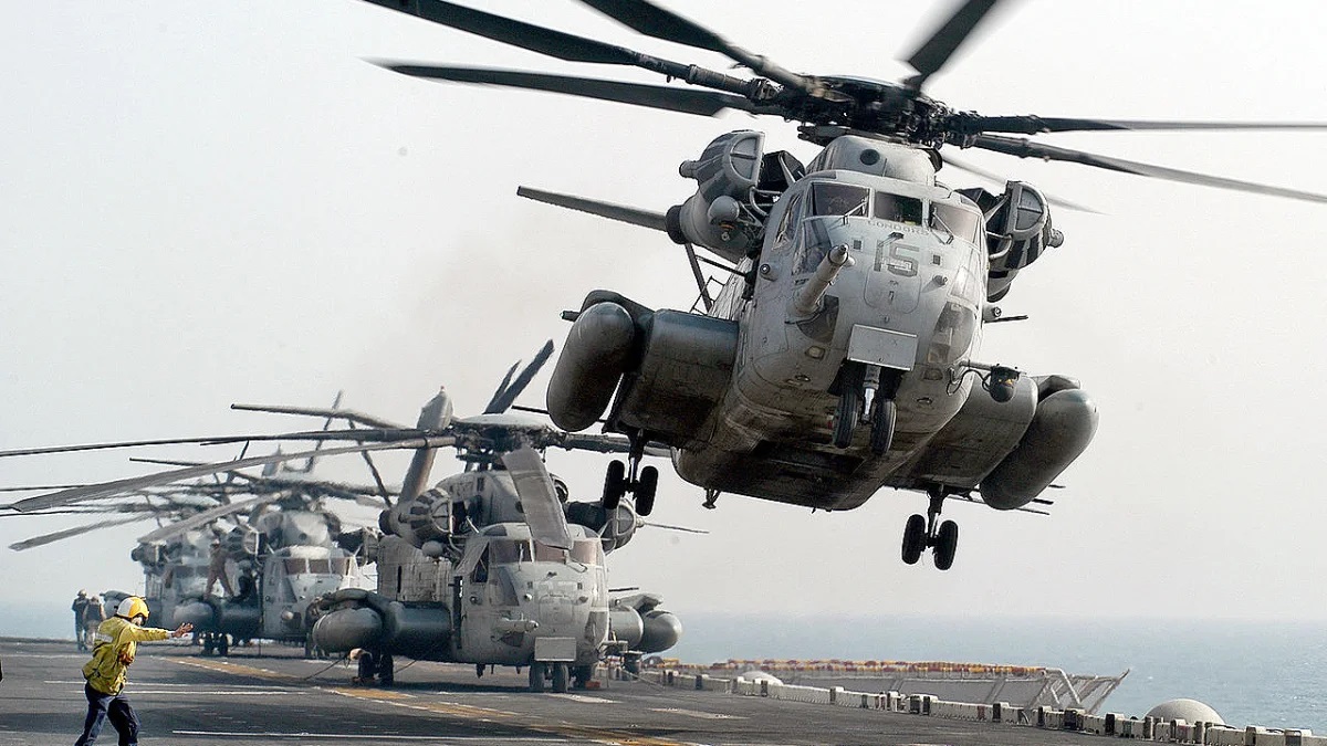 Aircraft carrier and helicopter
